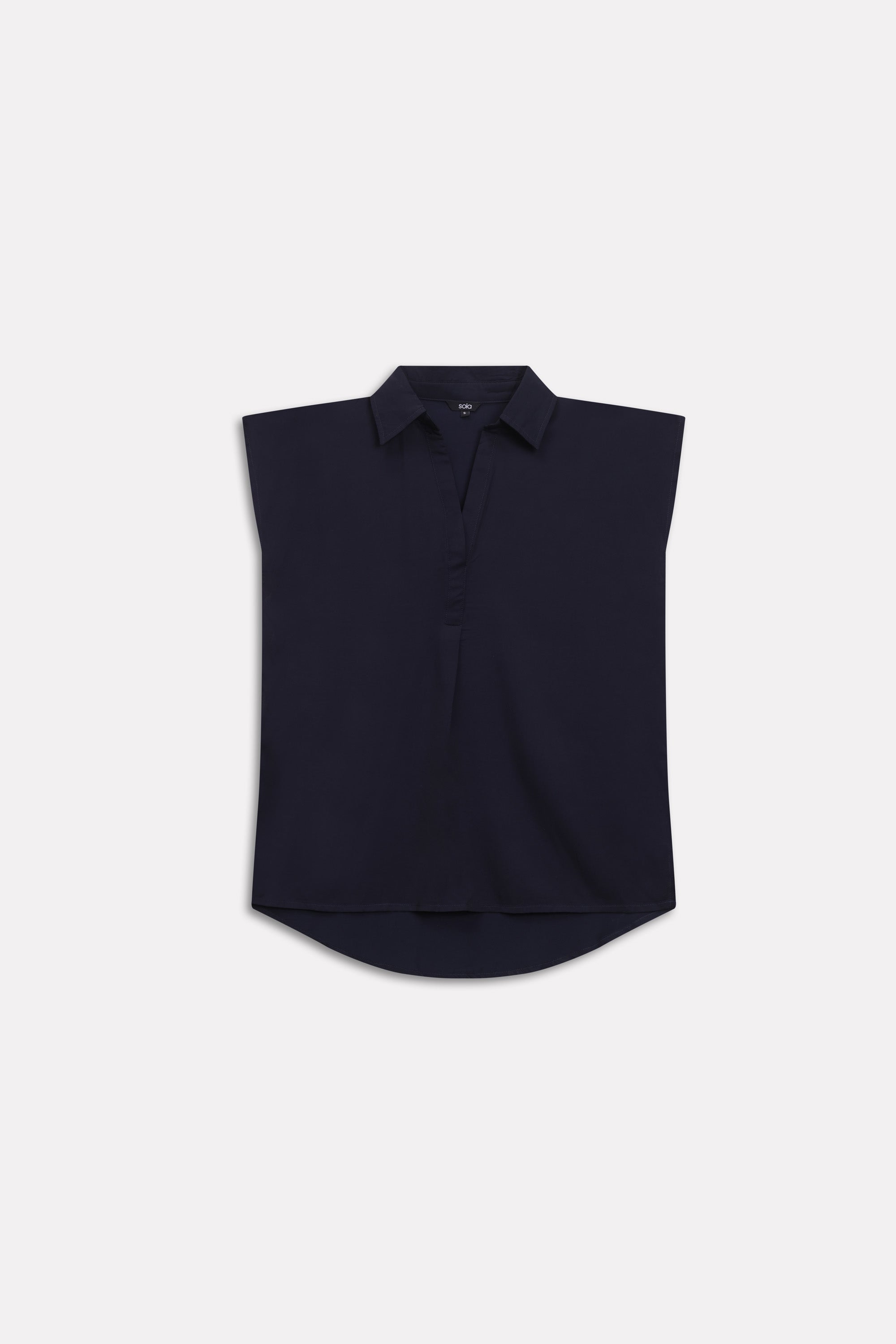 Close-up detail on the navy blue minimal cap sleeve woven shirt, by SOLA Pakistan.