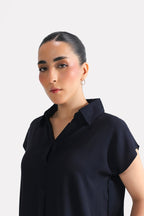 Texture and fabric detail, navy blue minimal cap sleeve woven shirt, by SOLA Pakistan.