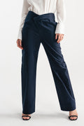 Navy blue sculpted high waisted layered wide leg trouser, worn by a model, by SOLA Pakistan.