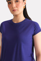 Close-up detail on the navy cap sleeve t-shirt, by SOLA Pakistan.