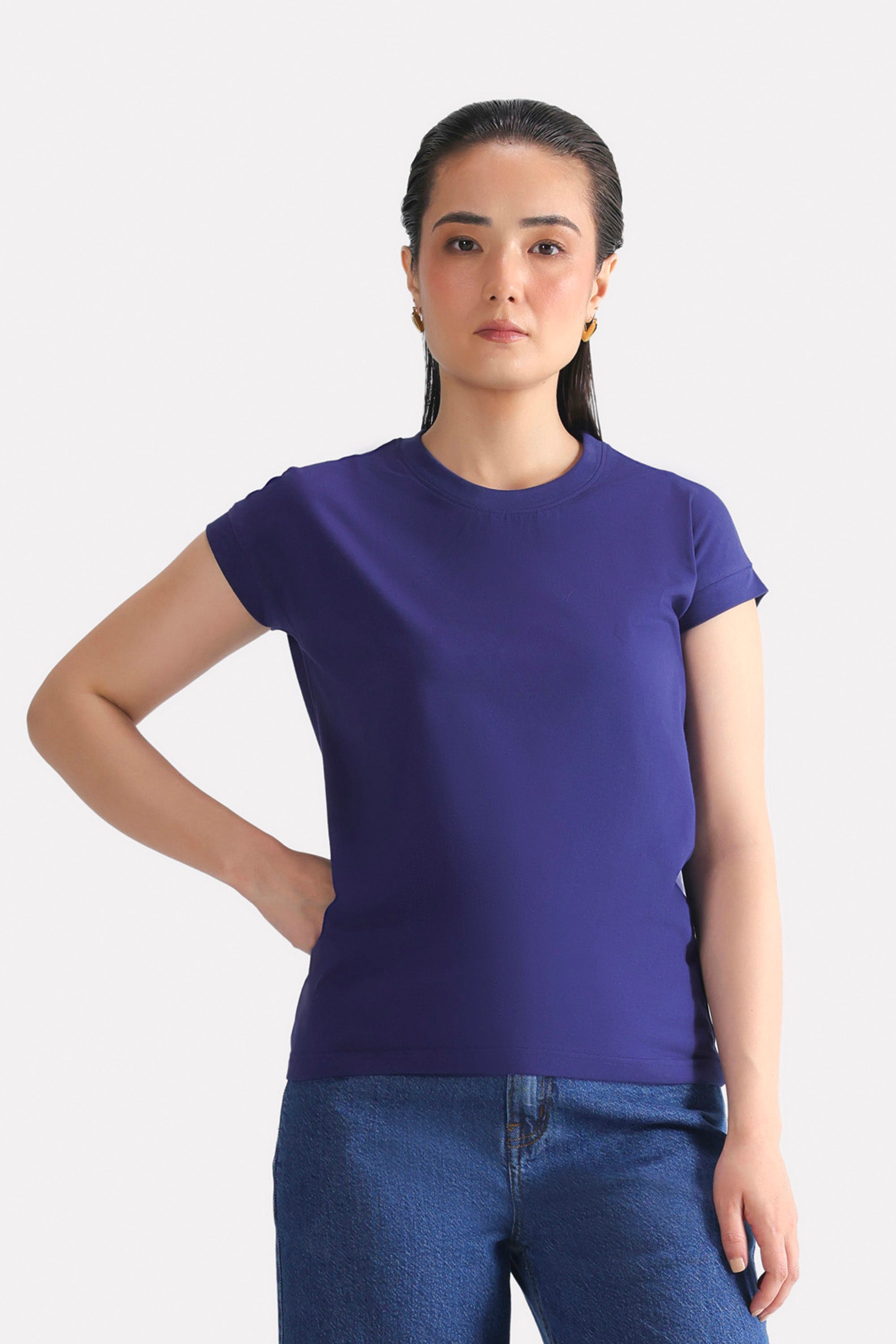 Navy cap sleeve t-shirt in cotton, worn by a model, by SOLA Pakistan.