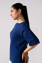 Close-up detail on the navy round neck t-shirt, by SOLA Pakistan.