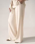 Off white cinched waist bottom, full styled look, by SOLA Pakistan.