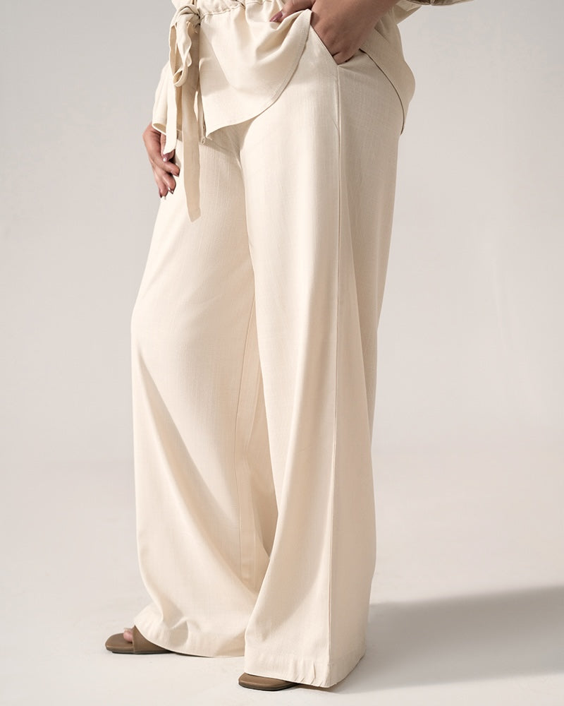 Off white cinched waist bottom, full styled look, by SOLA Pakistan.