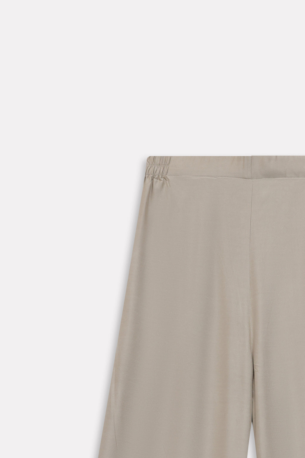 Olive button detail co-ord bottom shown in a styled fit, by SOLA Pakistan.