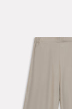 Olive button detail co-ord bottom shown in a styled fit, by SOLA Pakistan.
