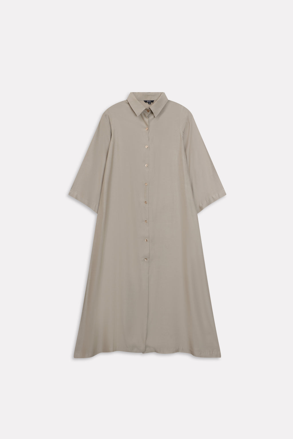 Flat lay of the olive button detail co-ord top, by SOLA Pakistan.