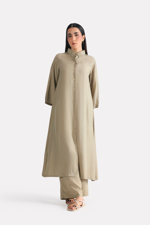 Olive button detail co-ord top in lyocell, worn by a model, by SOLA Pakistan.