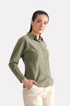 Olive refined pleated woven shirt in cotton-linen blend, worn by a model, by SOLA Pakistan.
