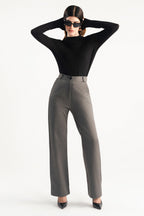 Close-up detail on the onyx grey high waisted wide leg tailored trouser, by SOLA Pakistan.