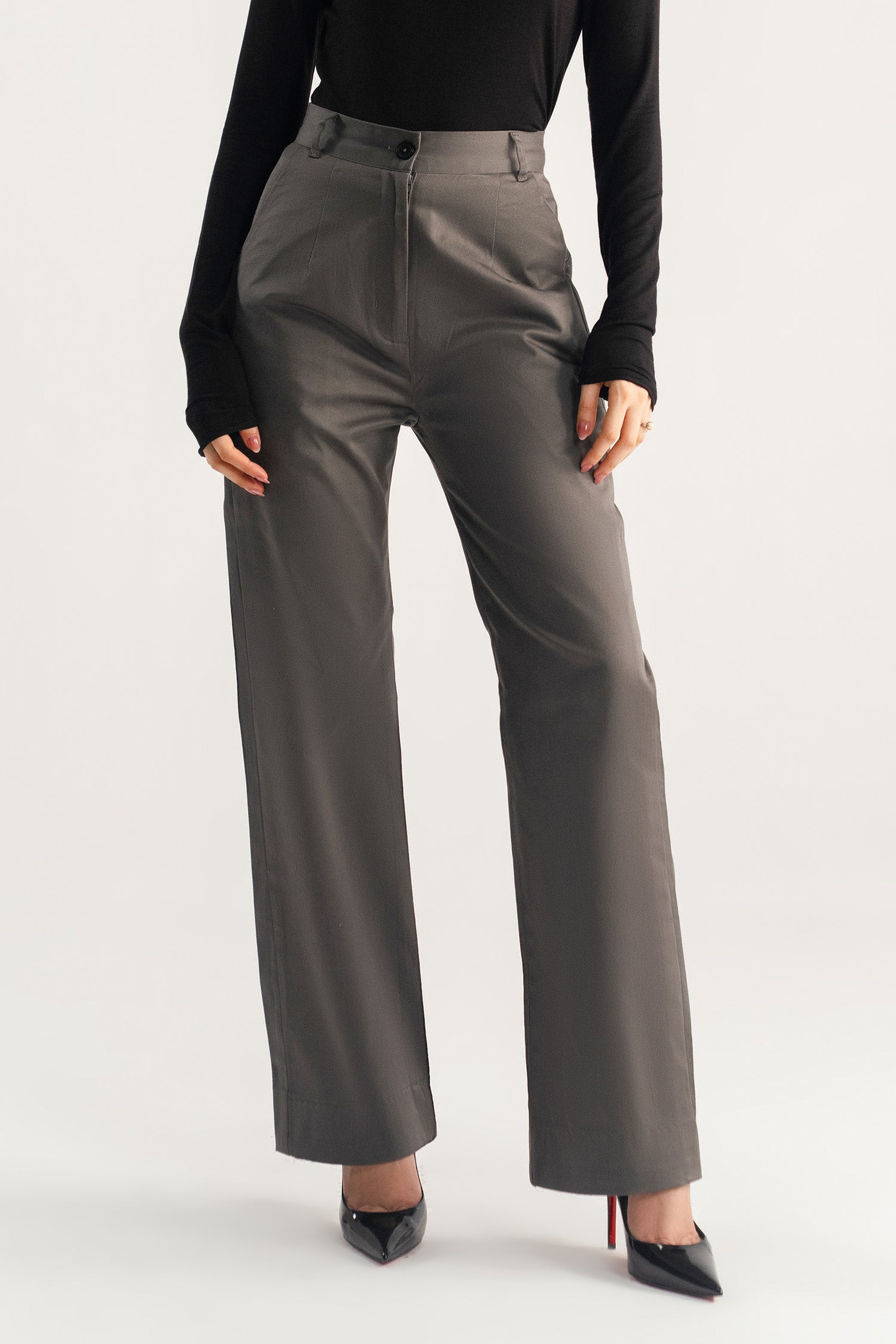 Onyx grey high waisted wide leg tailored trouser, worn by a model, by SOLA Pakistan.