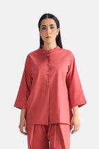 Peach (apricot) loop & lounge top in cotton-linen blend, worn by a model, by SOLA Pakistan.
