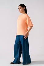 Peach (apricot) round neck t-shirt, full styled look, by SOLA Pakistan.