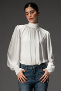 Pearl white gathered highneck blouse, worn by a model, by SOLA Pakistan.