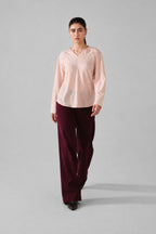 Close-up detail on the pink powder pink top, by SOLA Pakistan.