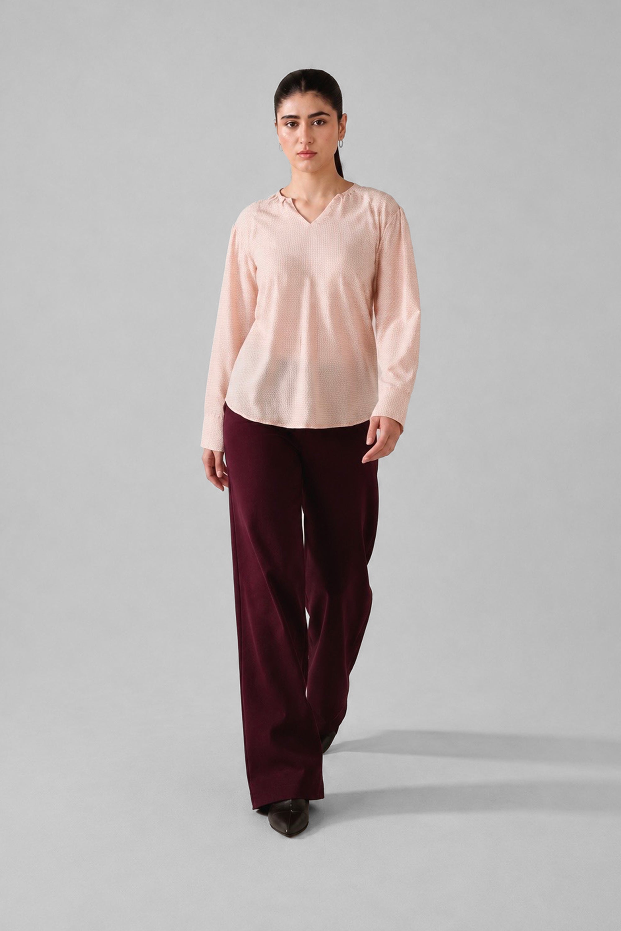 Close-up detail on the pink powder pink top, by SOLA Pakistan.