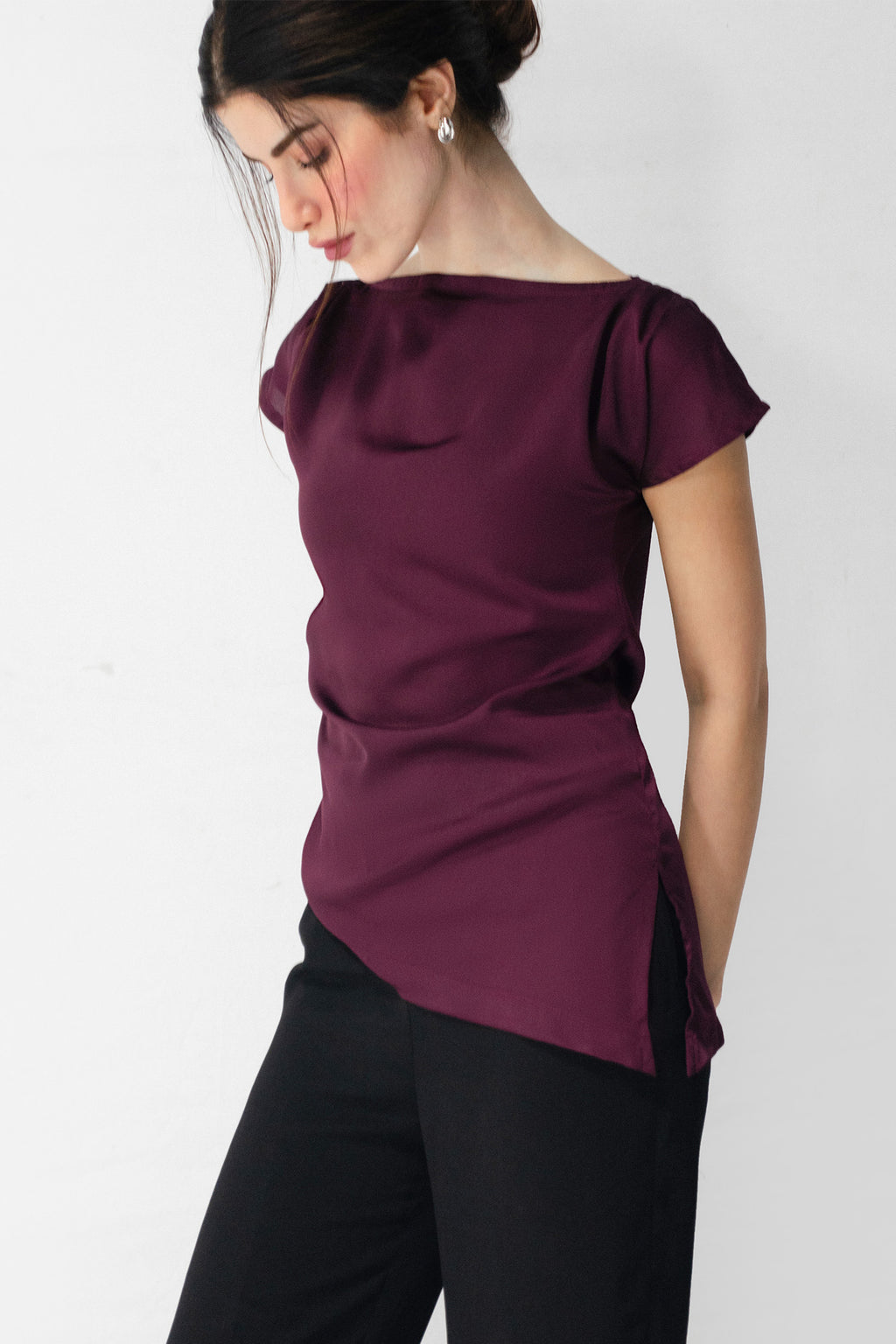 Plum drapped asymmetrical wrap top, full styled look, by SOLA Pakistan.