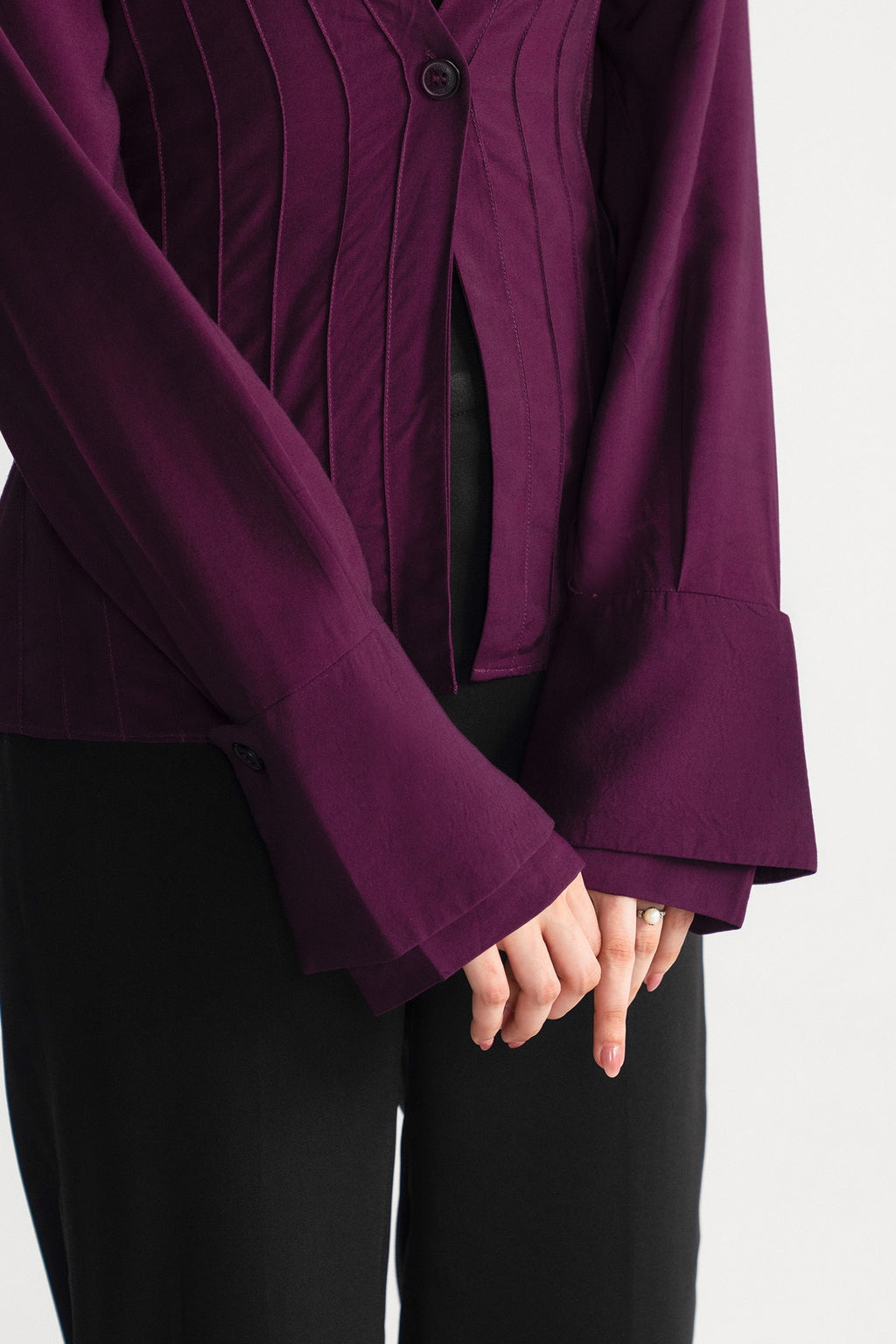 Plum tailored pintuck shirt shown in a styled fit, by SOLA Pakistan.