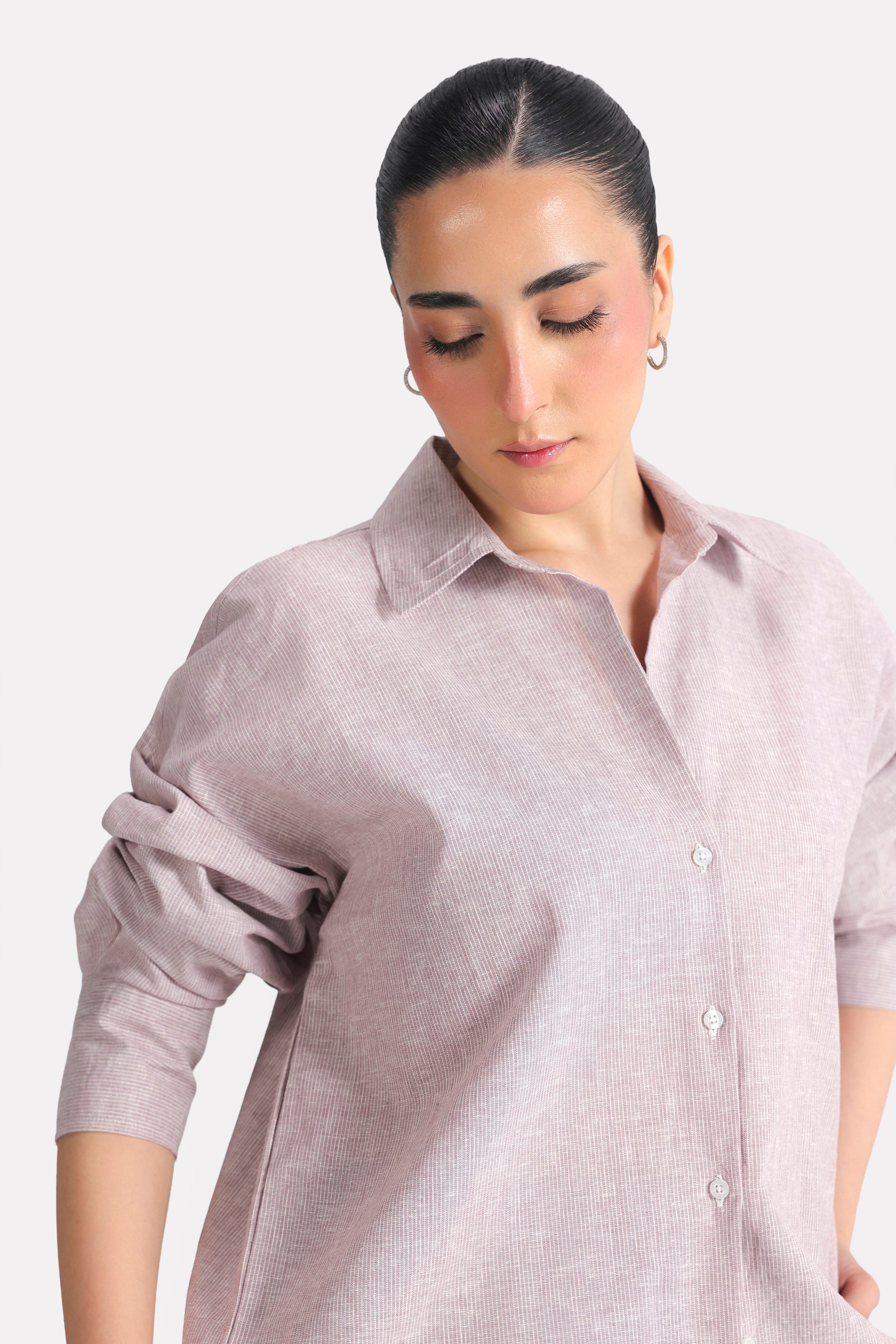 Close-up detail on the red cherry stripe relaxed fit striped shirt, by SOLA Pakistan.
