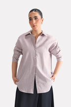 Red cherry stripe relaxed fit striped shirt in cotton-linen blend, worn by a model, by SOLA Pakistan.
