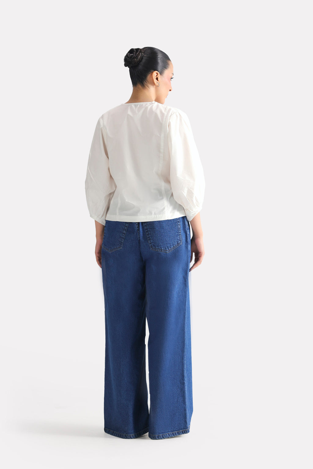 White balloon sleeve relaxed top, alternate angle, by SOLA Pakistan.
