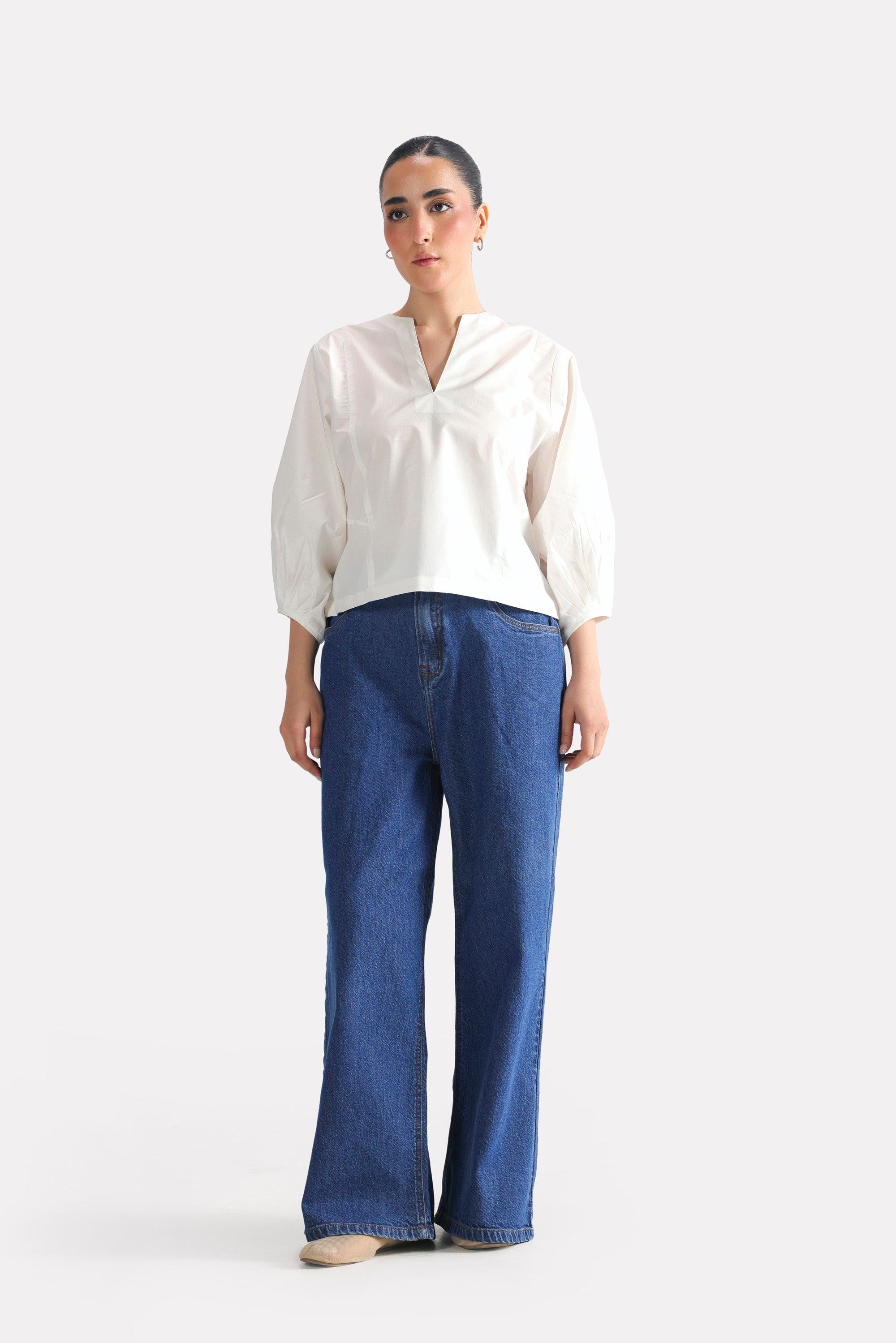 White balloon sleeve relaxed top, full styled look, by SOLA Pakistan.
