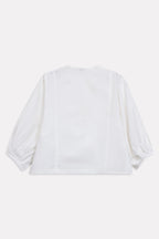 White balloon sleeve relaxed top shown in a styled fit, by SOLA Pakistan.