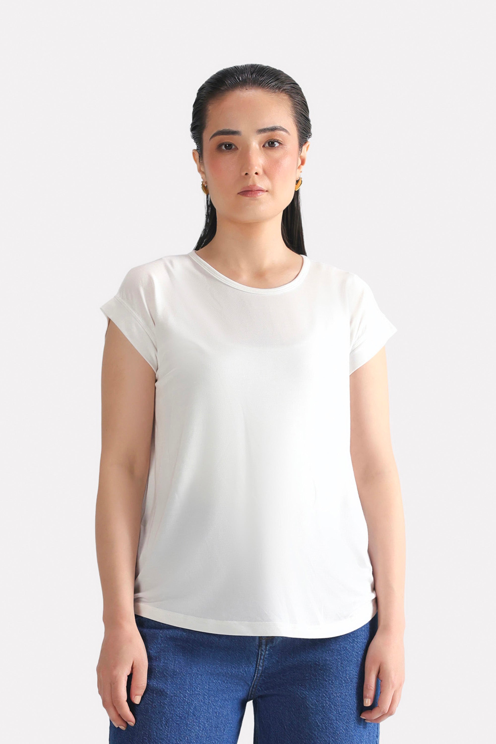 White featherweight modal t-shirt, worn by a model, by SOLA Pakistan.