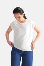 White featherweight modal t-shirt shown in a styled fit, by SOLA Pakistan.