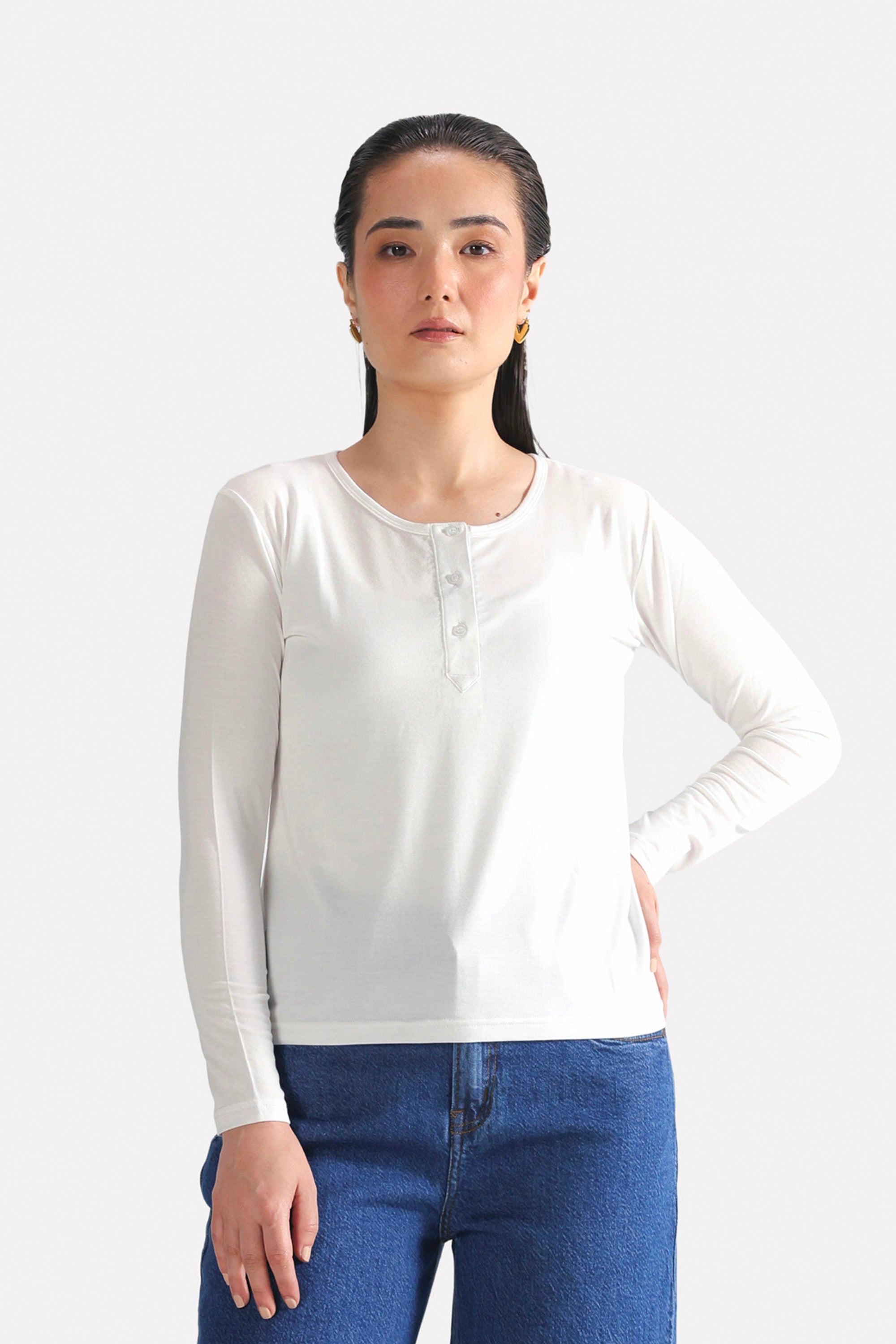 Flat lay of the white henley t-shirt, by SOLA Pakistan.