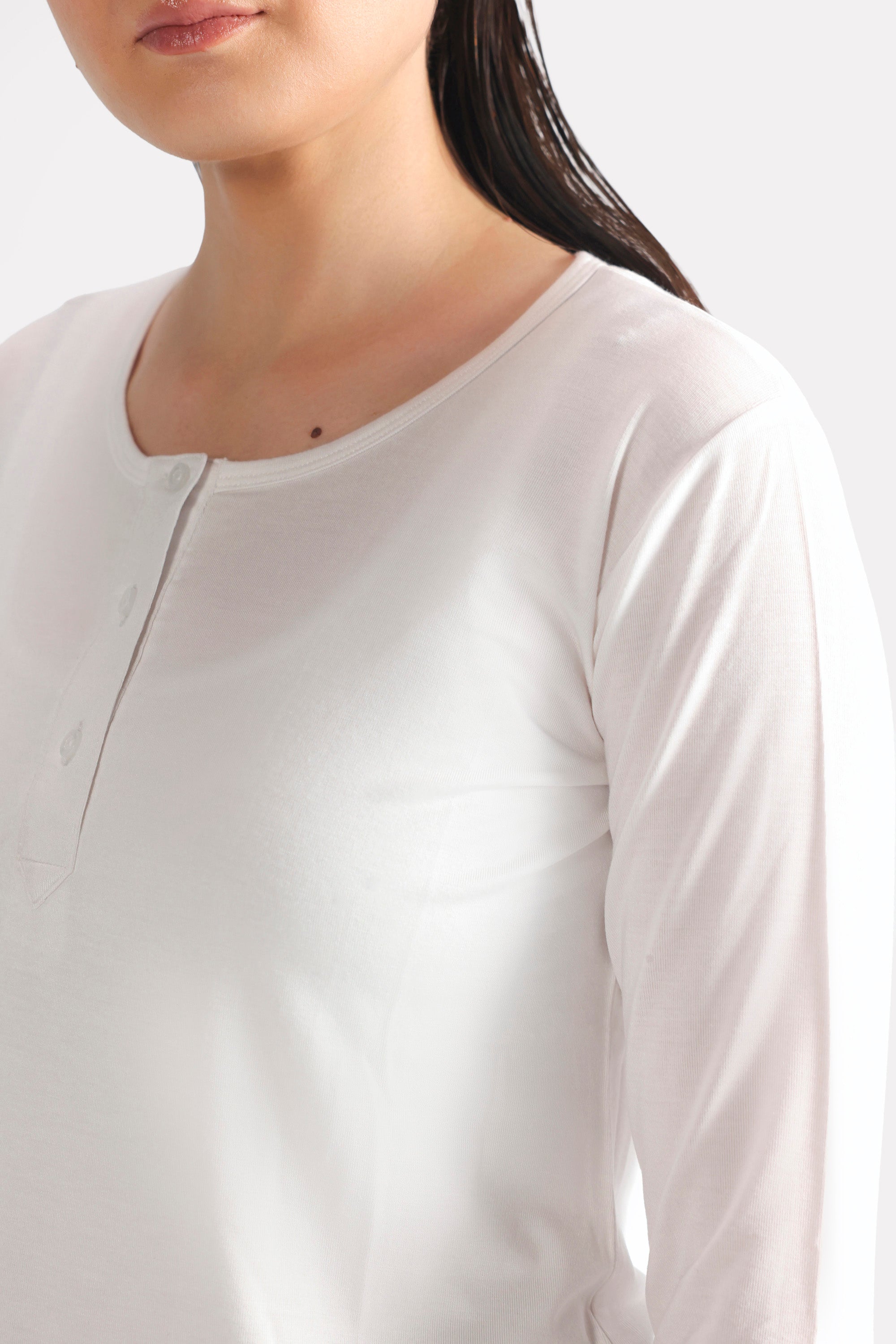 White henley t-shirt shown in a styled fit, by SOLA Pakistan.