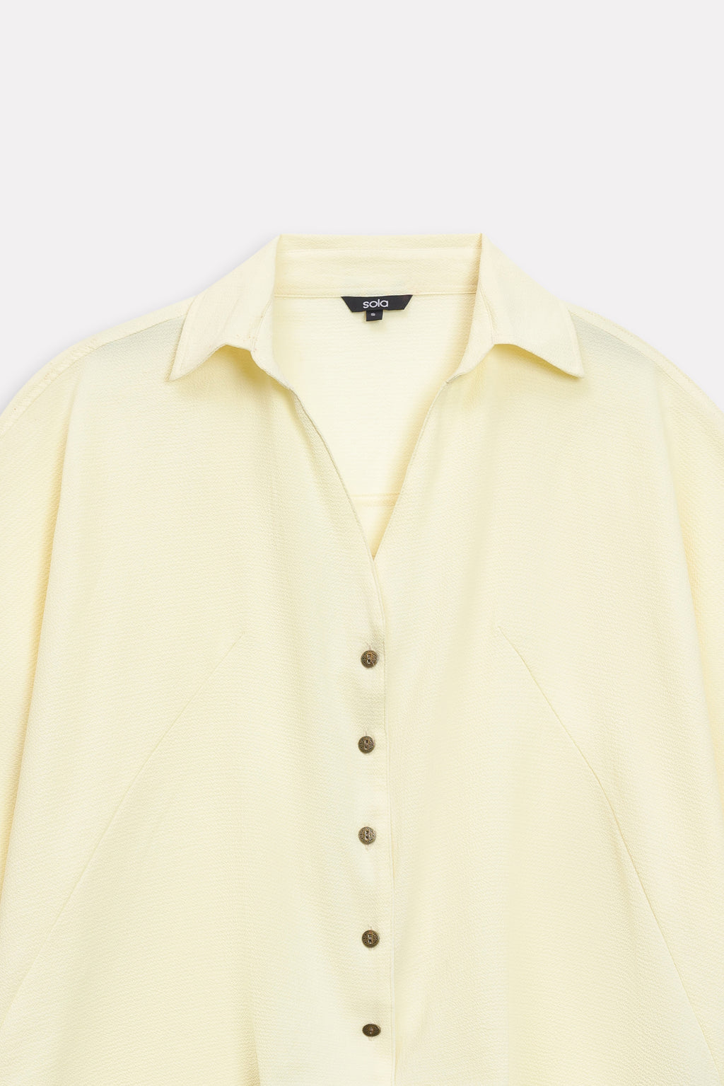 Additional view of the yellow bubble hem oversized top, by SOLA Pakistan.