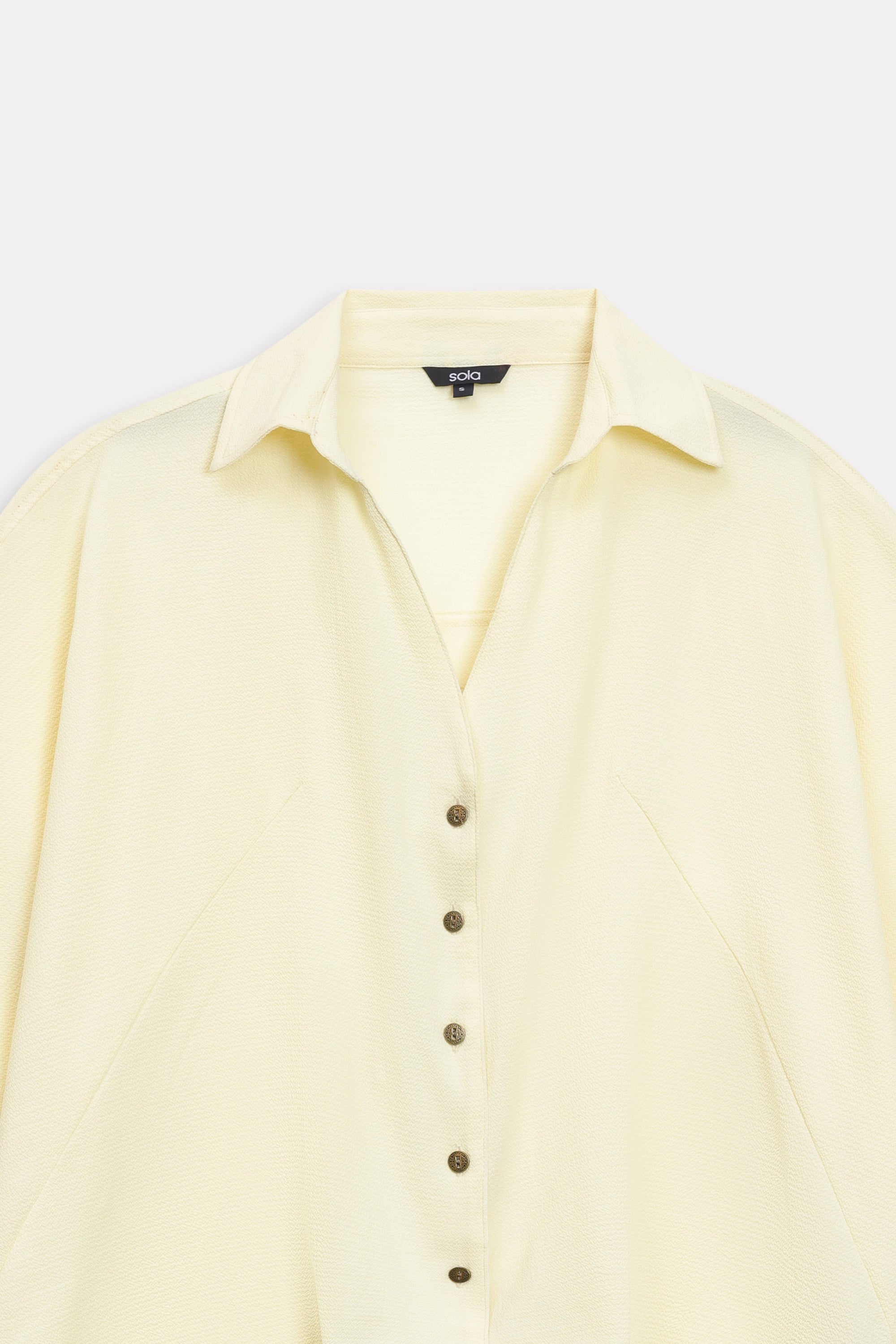 Additional view of the yellow bubble hem oversized top, by SOLA Pakistan.