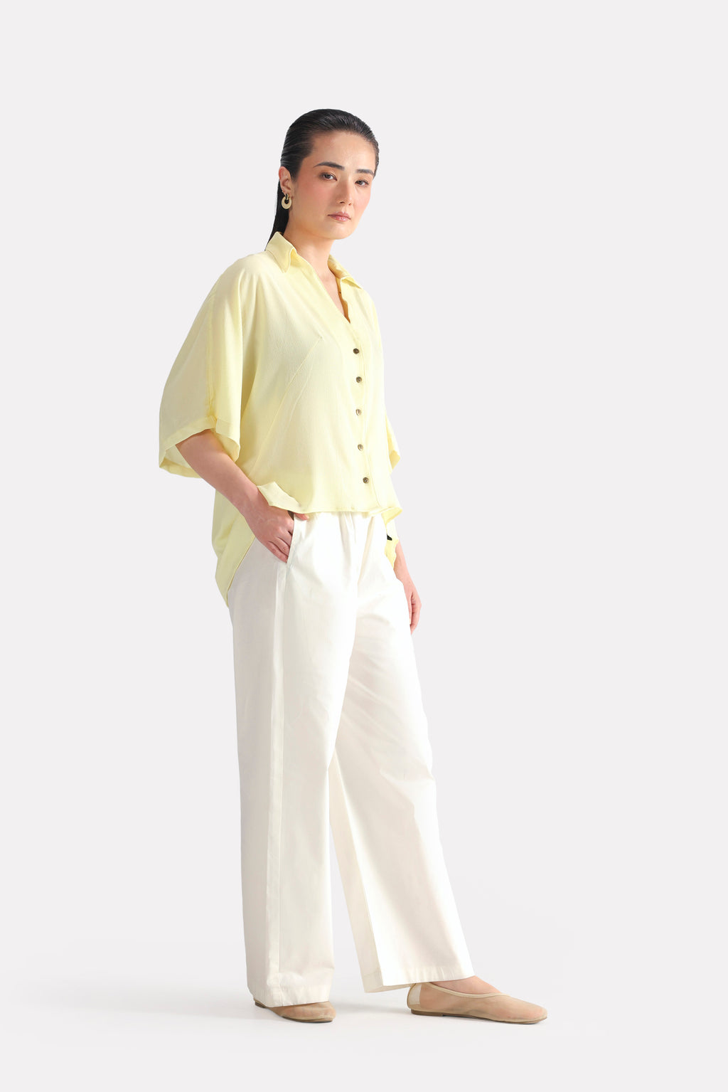 Yellow bubble hem oversized top, full styled look, by SOLA Pakistan.