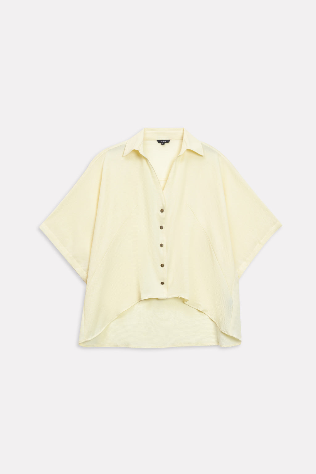 Yellow bubble hem oversized top shown in a styled fit, by SOLA Pakistan.